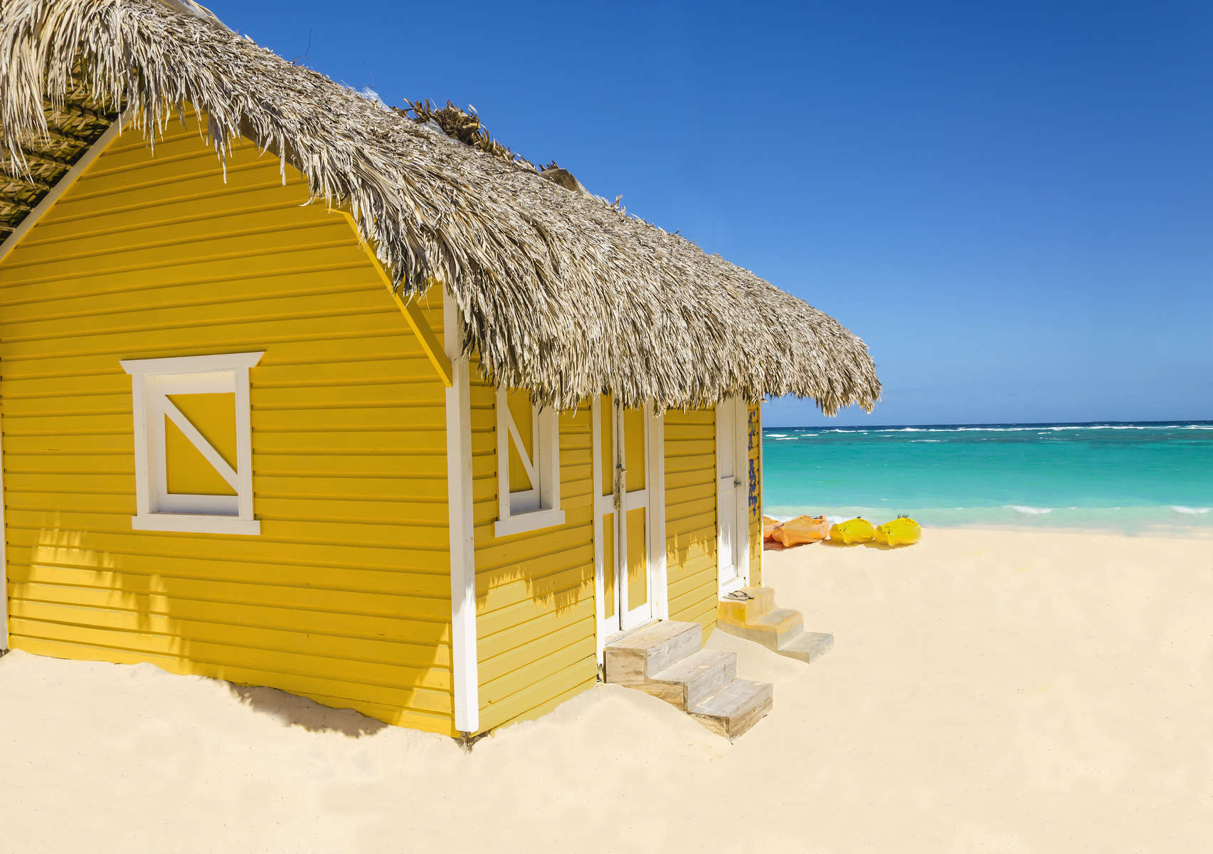 Wooden yellow beach cottage
