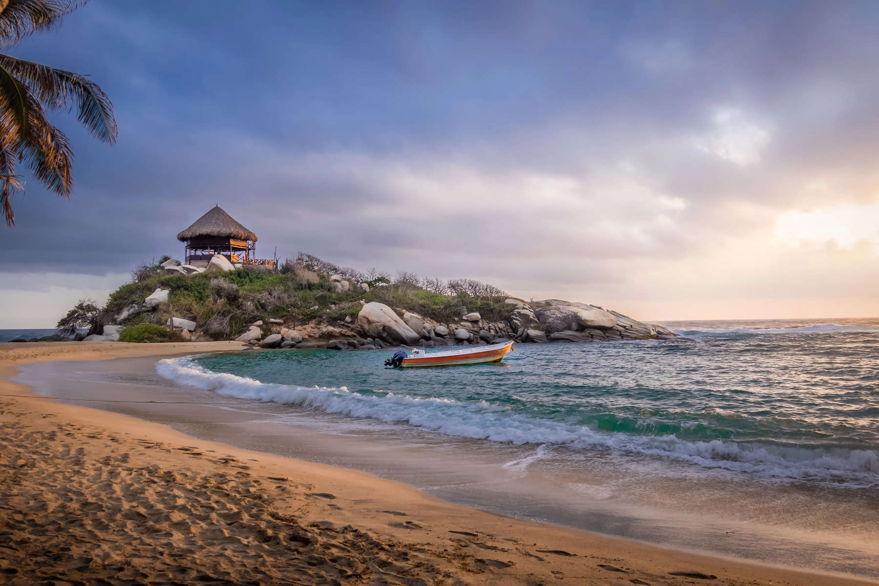 Sunrise and beach hut at Cabo San Juan - Tayrona Natural Nationa